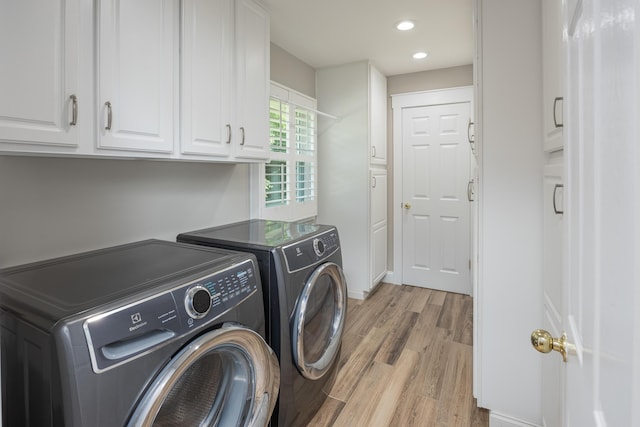 305 River Pointe Cir NE, Charleston, TN 37310 - laundry area with washer and dryer, light wood-type flooring, cabinet space, and recessed lighting