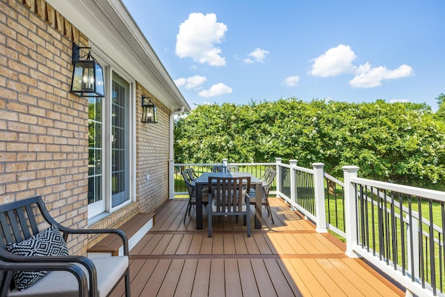 305 River Pointe Cir NE, Charleston, TN 37310 - wooden deck featuring outdoor dining area