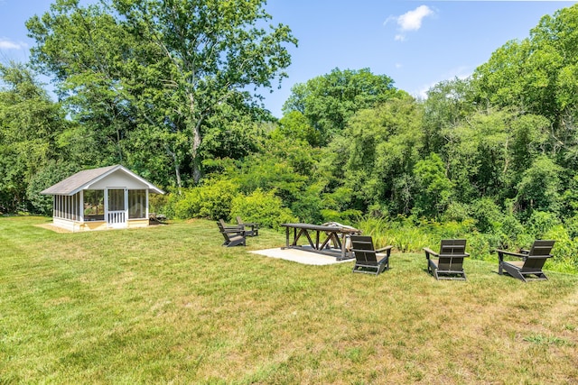 305 River Pointe Cir NE, Charleston, TN 37310 - view of green lawn with a view of trees