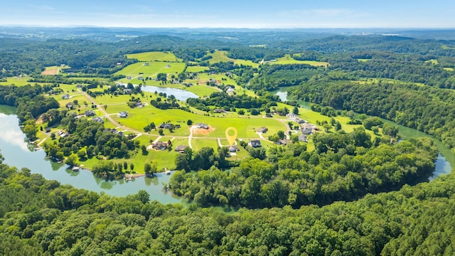 305 River Pointe Cir NE, Charleston, TN 37310 - drone / aerial view of a nearby body of water and a heavily wooded area