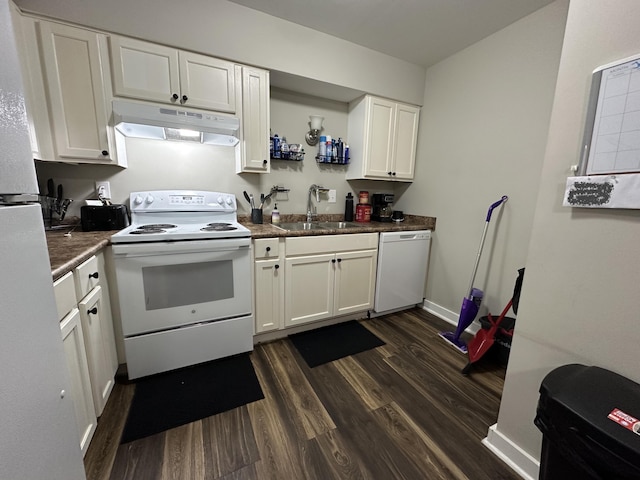 3420 Birchwood Dr, Chattanooga, TN 37406 - kitchen featuring white appliances, under cabinet range hood, dark wood-style floors, white cabinetry, and dark countertops