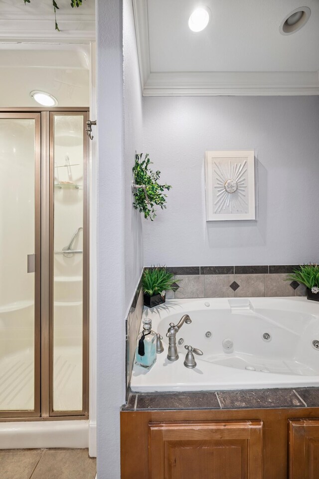 2507 Saint Lucie Ct, Chattanooga, TN 37421 - full bath featuring a shower stall, a whirlpool tub, crown molding, and tile patterned floors