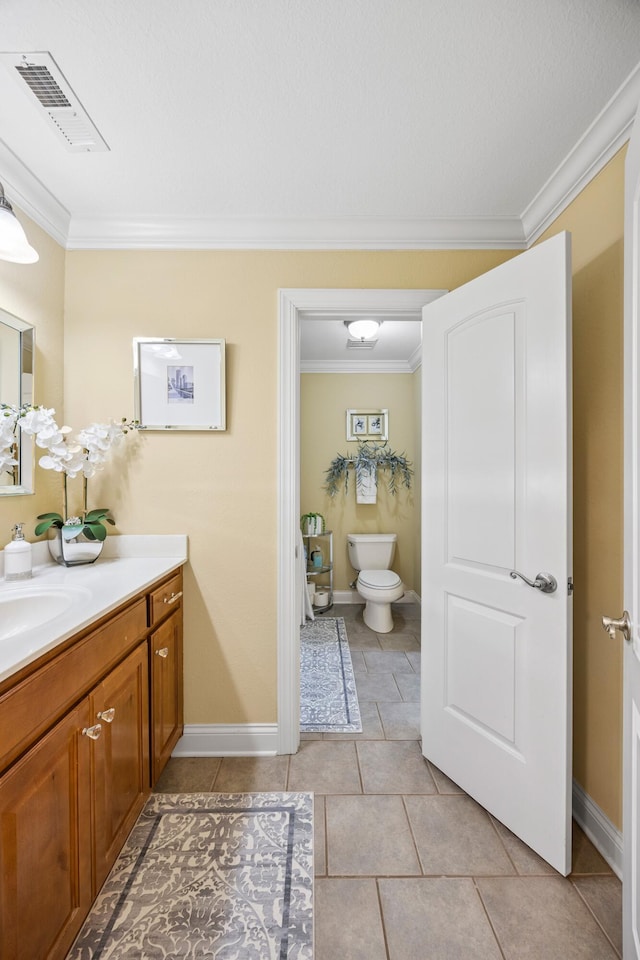 2507 Saint Lucie Ct, Chattanooga, TN 37421 - bathroom featuring vanity, crown molding, and tile patterned flooring