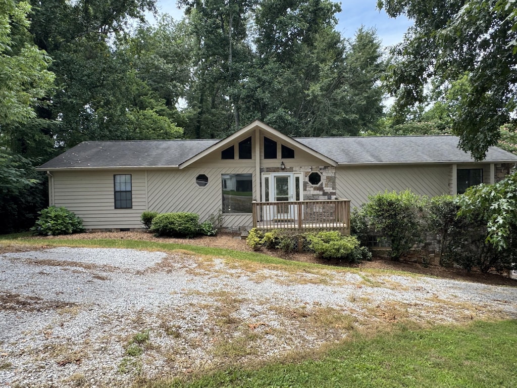7162 Lea Rd, Chattanooga, TN 37421 - view of front of home featuring a deck, crawl space, and a shingled roof