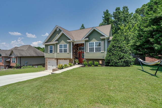 9129 Wood Dale Ln, Hixson, TN 37343 - bi-level home featuring driveway and a garage