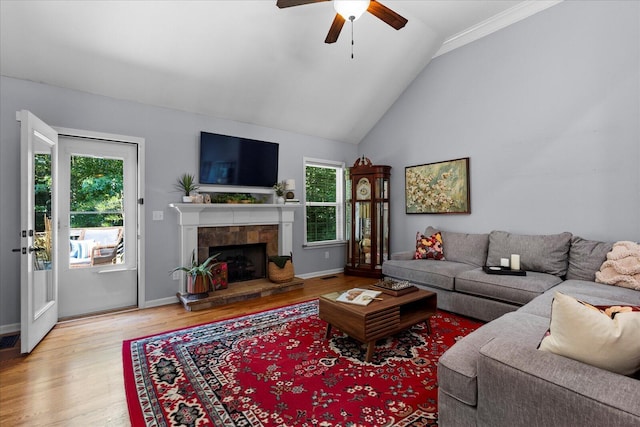 9129 Wood Dale Ln, Hixson, TN 37343 - living area with a ceiling fan, wood finished floors, a fireplace, and high vaulted ceiling