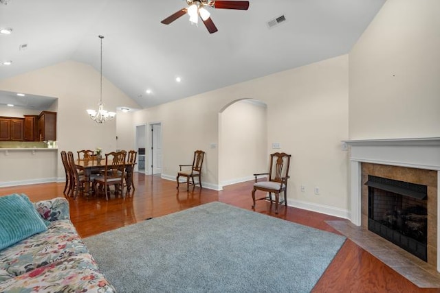 9624 Collier Pl, Ooltewah, TN 37363 - living area with a ceiling fan, arched walkways, wood finished floors, a fireplace, and recessed lighting