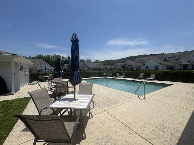 9624 Collier Pl, Ooltewah, TN 37363 - community pool with a patio and a residential view