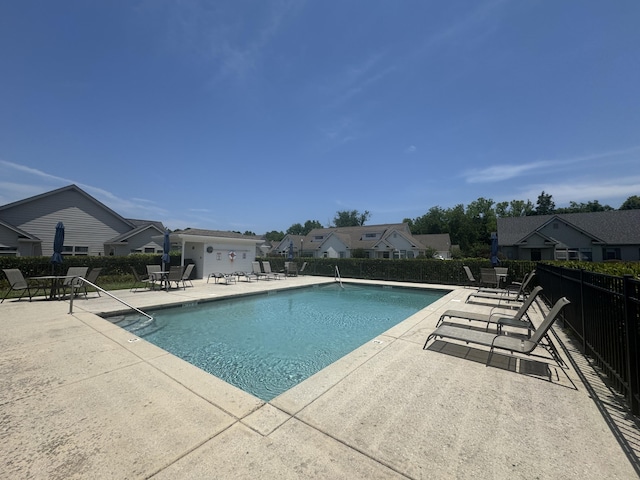 9624 Collier Pl, Ooltewah, TN 37363 - community pool with a patio area and a residential view