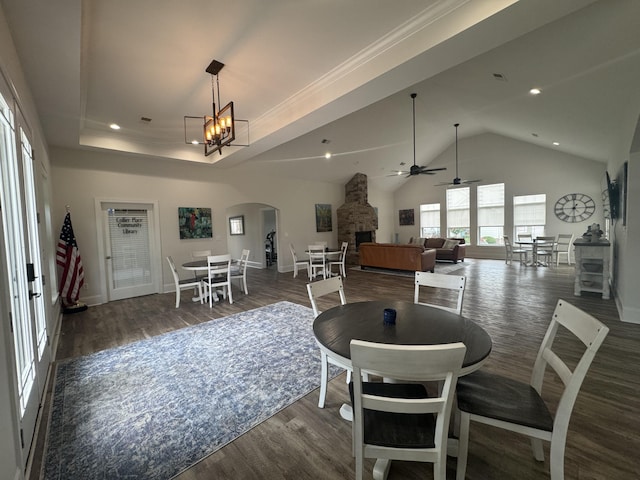9624 Collier Pl, Ooltewah, TN 37363 - dining room with arched walkways, wood finished floors, a ceiling fan, recessed lighting, and lofted ceiling