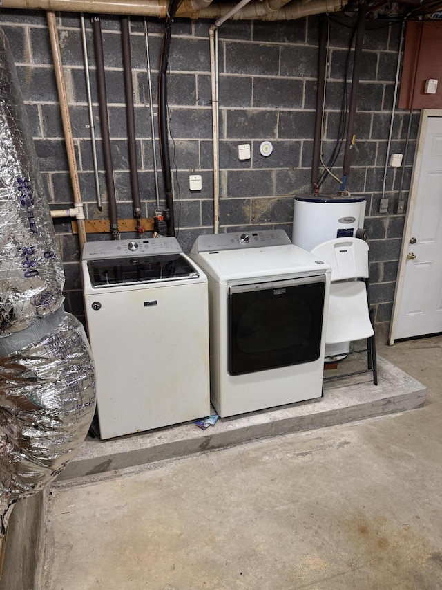 311 Branch Dr, Hixson, TN 37343 - laundry room featuring independent washer and dryer, water heater, and concrete block wall