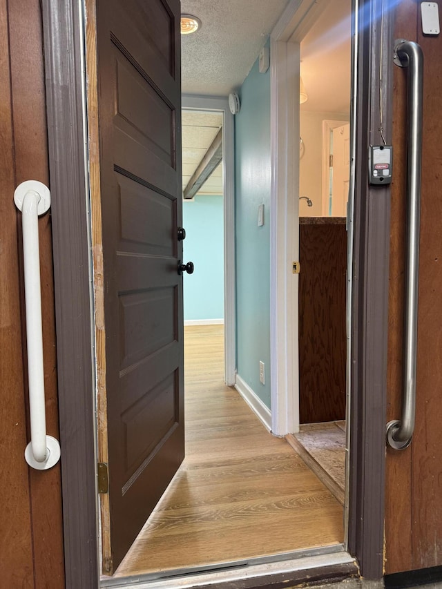311 Branch Dr, Hixson, TN 37343 - hall with wood finished floors and a textured ceiling