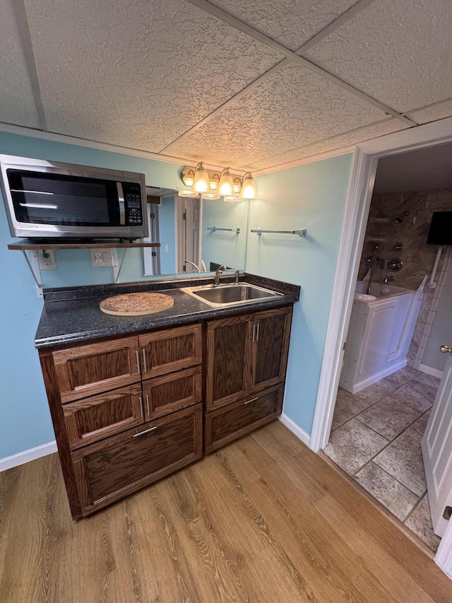 311 Branch Dr, Hixson, TN 37343 - full bathroom with double vanity and wood finished floors
