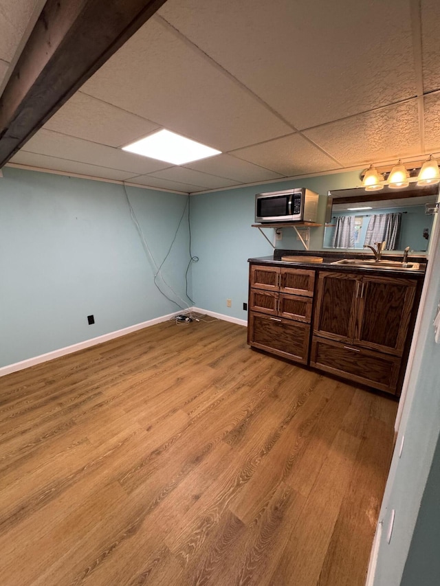 311 Branch Dr, Hixson, TN 37343 - finished below grade area featuring wood finished floors and a drop ceiling