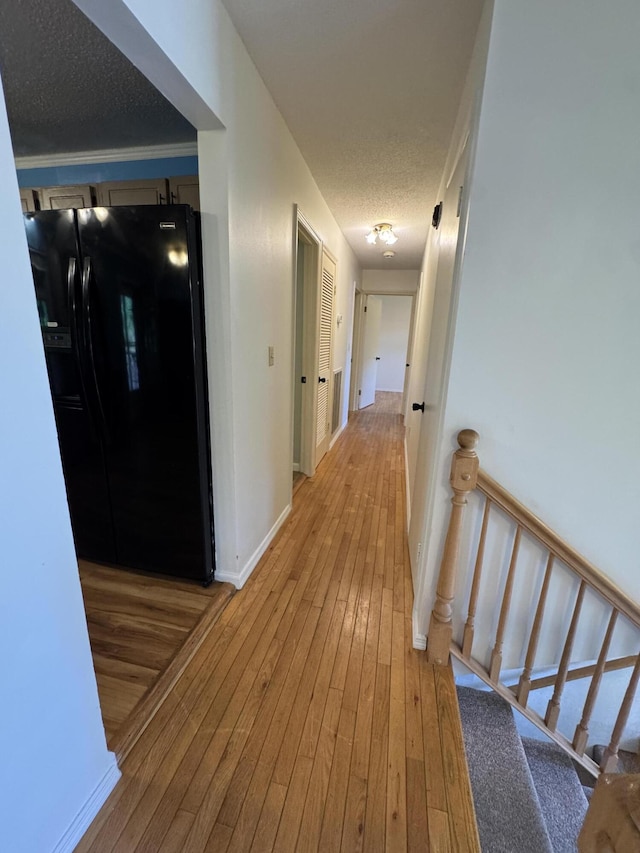 311 Branch Dr, Hixson, TN 37343 - hallway featuring light wood-type flooring and baseboards