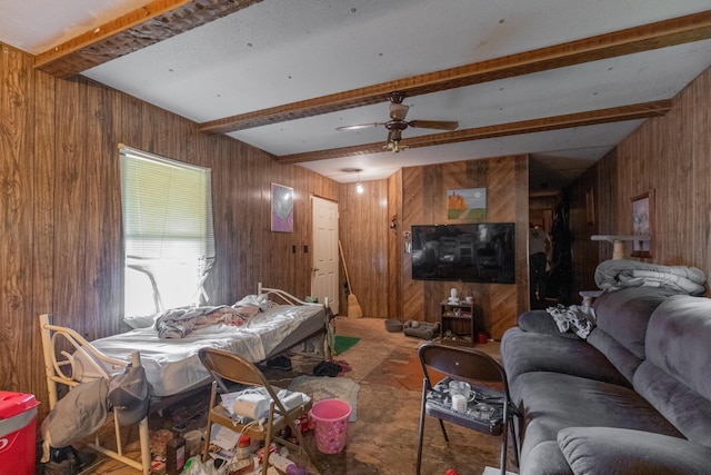14865 US-11, Trenton, GA 30752 - carpeted living area featuring wooden walls, beam ceiling, and a ceiling fan