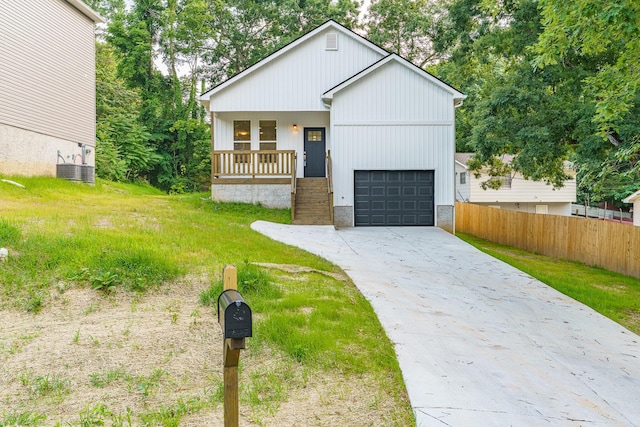 3016 Addison Rd, Chattanooga, TN 37406 - view of front of property with covered porch, concrete driveway, a garage, and stairs