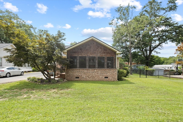 157 Park Ave, Trion, GA 30753 - view of property exterior featuring crawl space, brick siding, and a sunroom