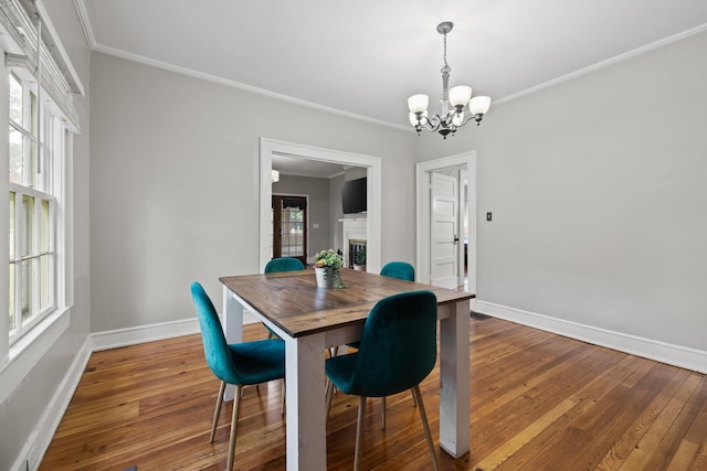 157 Park Ave, Trion, GA 30753 - dining area featuring a chandelier, hardwood / wood-style floors, and ornamental molding