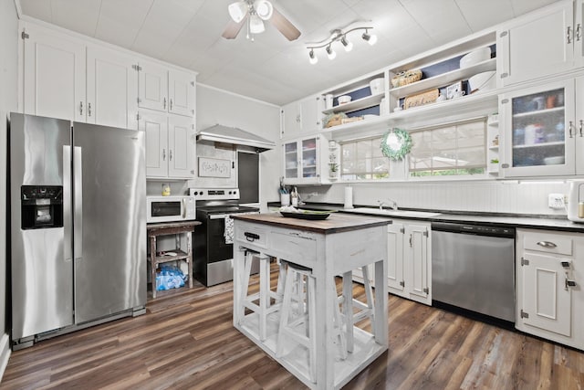 157 Park Ave, Trion, GA 30753 - kitchen featuring stainless steel appliances, white cabinetry, ceiling fan, and dark wood-type flooring