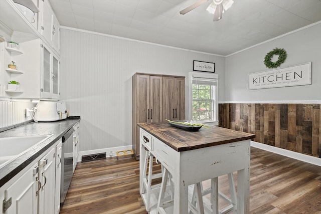 157 Park Ave, Trion, GA 30753 - kitchen with wood counters, dark wood-style floors, ornamental molding, wooden walls, and a ceiling fan