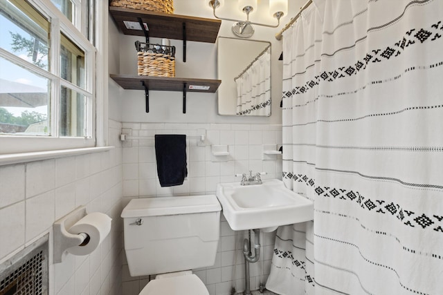 157 Park Ave, Trion, GA 30753 - full bath featuring tile walls, healthy amount of natural light, a shower with shower curtain, and wainscoting