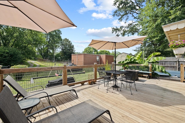 157 Park Ave, Trion, GA 30753 - wooden terrace featuring outdoor dining area and a fenced backyard