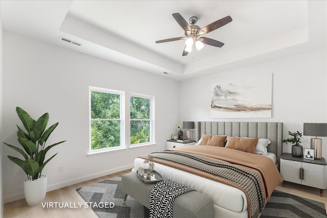 845 James Ave, Chattanooga, TN 37421 - bedroom with a tray ceiling and wood finished floors