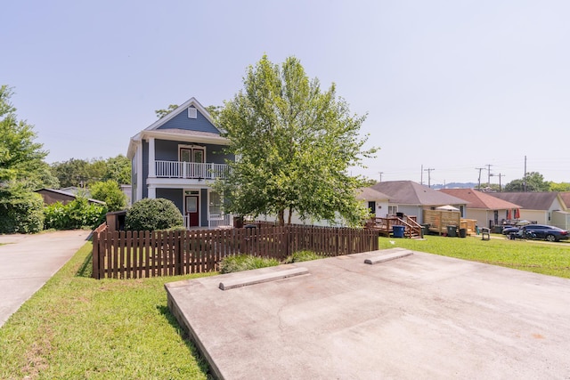 1106 Flynn St, Chattanooga, TN 37403 - view of front facade featuring a fenced front yard and a balcony