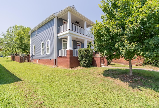 1106 Flynn St, Chattanooga, TN 37403 - view of home's exterior with a balcony, a ceiling fan, crawl space, and a porch