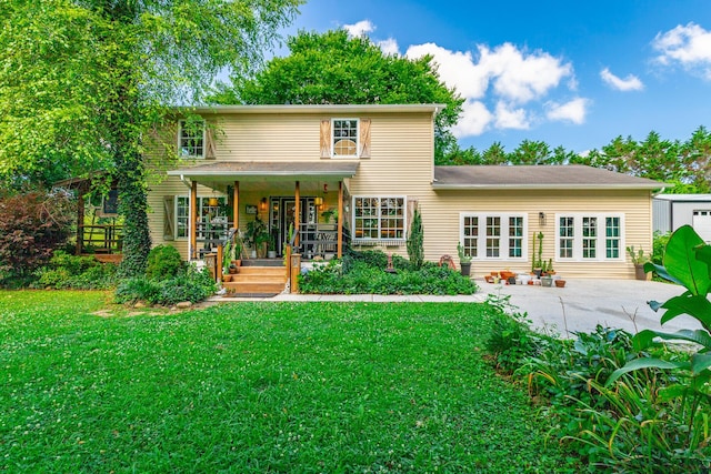 1727 Saunders Rd, Ringgold, GA 30736 - rear view of property featuring a lawn and a patio area