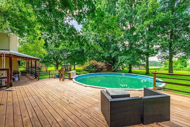 1727 Saunders Rd, Ringgold, GA 30736 - swimming pool featuring a wooden deck and a lawn