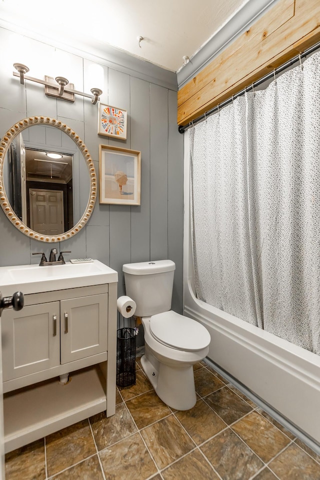 1727 Saunders Rd, Ringgold, GA 30736 - bathroom featuring vanity, shower / bathtub combination with curtain, a decorative wall, and stone finish flooring