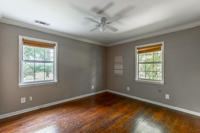 1727 Saunders Rd, Ringgold, GA 30736 - empty room with plenty of natural light, dark wood finished floors, a ceiling fan, and crown molding