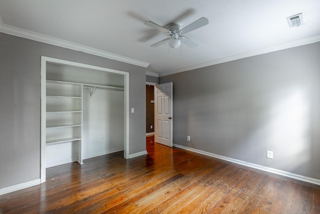 1727 Saunders Rd, Ringgold, GA 30736 - unfurnished bedroom with crown molding, hardwood / wood-style floors, a closet, and ceiling fan