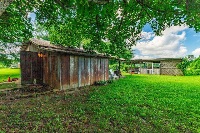 1727 Saunders Rd, Ringgold, GA 30736 - view of green lawn with an outbuilding