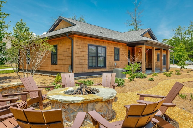 6 Heather Ln, Rising Fawn, GA 30738 - back of house with an outdoor fire pit and a shingled roof