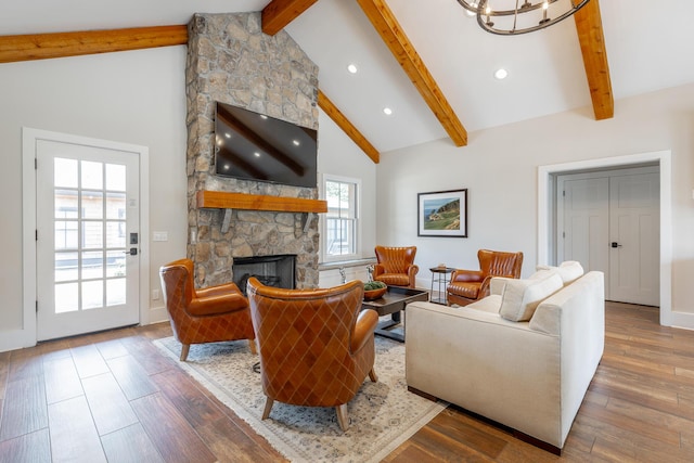 6 Heather Ln, Rising Fawn, GA 30738 - living room featuring plenty of natural light, a stone fireplace, recessed lighting, and wood finished floors