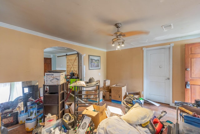 1502 E 49th St, Chattanooga, TN 37407 - living area with arched walkways, crown molding, ceiling fan, and wood finished floors
