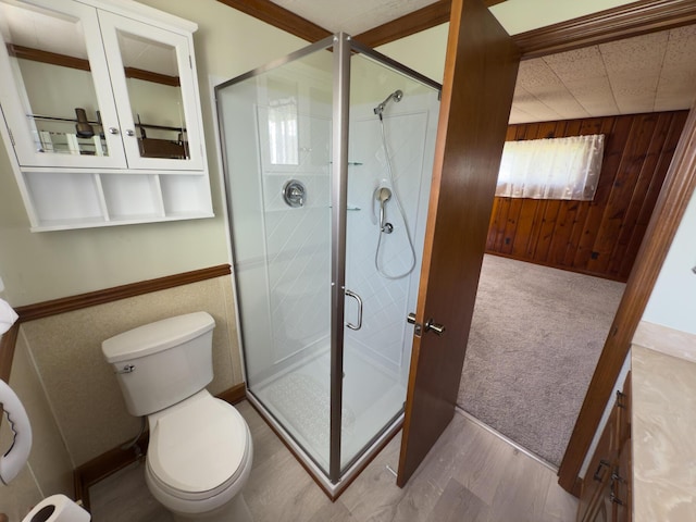 4630 Happy Valley Rd, Flintstone, GA 30725 - bathroom featuring a stall shower, wood walls, and wood finished floors