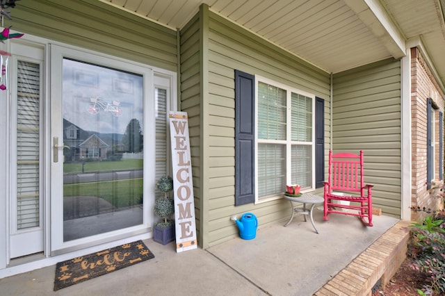 8189 Kaitlin Ln, Ooltewah, TN 37363 - doorway to property with covered porch