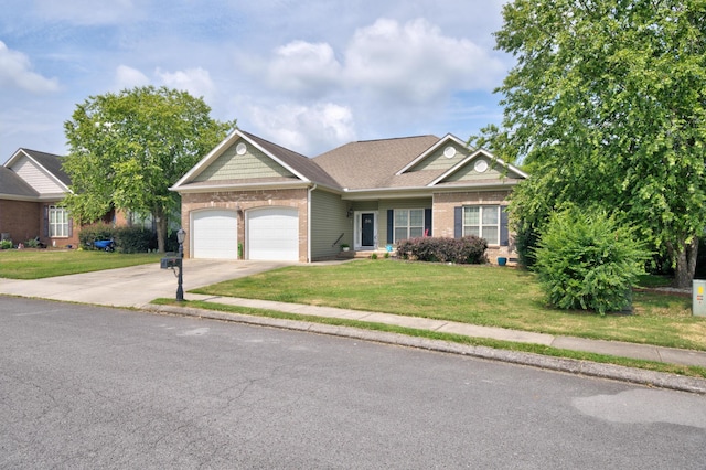 8189 Kaitlin Ln, Ooltewah, TN 37363 - view of front of house featuring a garage, a front lawn, driveway, brick siding, and roof with shingles