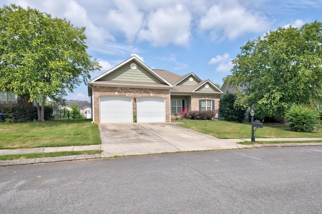 8189 Kaitlin Ln, Ooltewah, TN 37363 - view of front of property featuring brick siding, a front yard, an attached garage, and concrete driveway