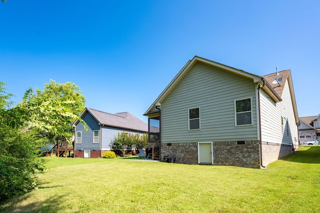 8502 Kennerly Ct, Ooltewah, TN 37363 - back of house featuring a yard and stairs