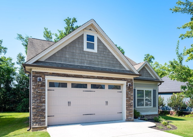 8502 Kennerly Ct, Ooltewah, TN 37363 - view of front of property with driveway, a shingled roof, a front lawn, stone siding, and an attached garage