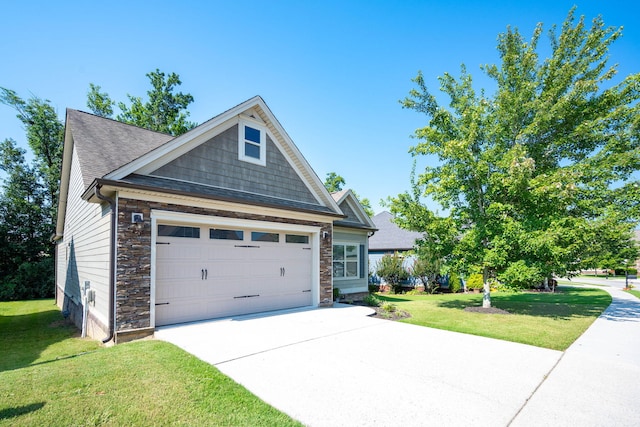 8502 Kennerly Ct, Ooltewah, TN 37363 - view of front facade featuring driveway, a front lawn, an attached garage, stone siding, and a shingled roof