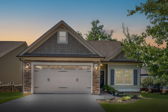 8502 Kennerly Ct, Ooltewah, TN 37363 - craftsman inspired home with concrete driveway, an attached garage, a yard, stone siding, and roof with shingles