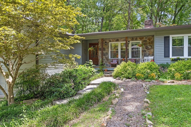 1617 Devlan Forest Ln, Signal Mountain, TN 37377 - view of front facade featuring a chimney and covered porch
