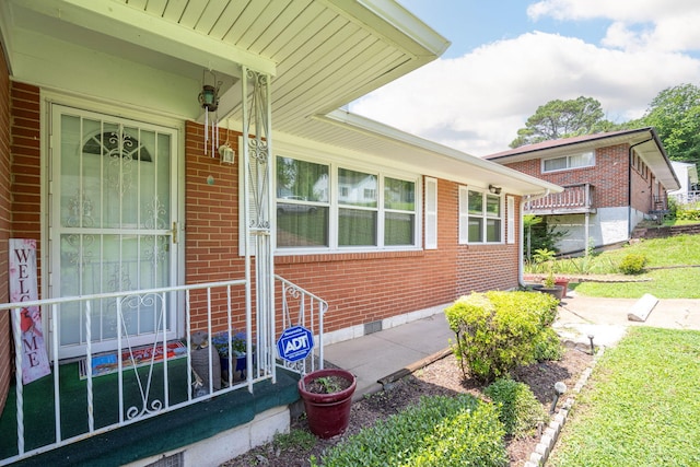 4312 Kemp Dr, Chattanooga, TN 37411 - view of exterior entry featuring brick siding and crawl space