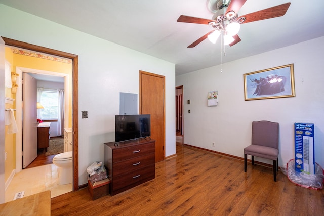 4312 Kemp Dr, Chattanooga, TN 37411 - sitting room with wood finished floors, ceiling fan, and electric panel